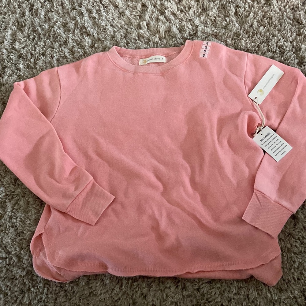 Bright pink, super soft crew neck sweatshirt